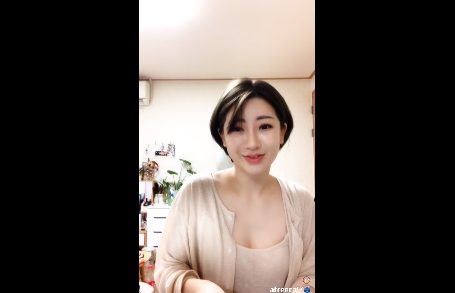 Short hair Korean woman showing off her tits